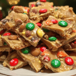 Christmas peanut butter clusters, M&M peanut butter candy, holiday treats, no-bake clusters, peanut butter chocolate treats Christmas peanut butter clusters, M&M peanut butter candy, holiday treats, no-bake clusters, peanut butter chocolate treats